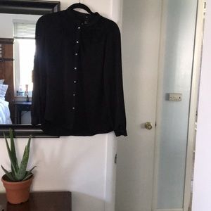 Black blouse with sheer lace detailing